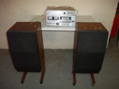 A JVC STEREO SYSTEM AND TWO VINTAGE SPEAKERS