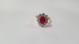 AN 18 CT YELLOW GOLD OVAL-CUT RUBY AND RBC DIAMOND CLUSTER RING, RUBY 2.25 CT, DIAMONDS 1.50 CT