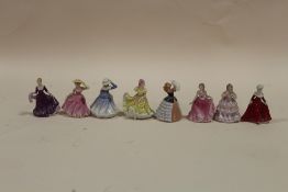 A COLLECTION OF EIGHT MINIATURE ROYAL DOULTON FIGURINES