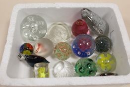 A BOX OF STUDIO GLASS PAPER WEIGHTS