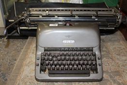 A VINTAGE GERMAN ADLER TYPEWRITER