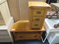 A MODERN OAK THREE DRAWER BEDSIDE CHEST AND A MATCHED LOW TV CABINET (2)