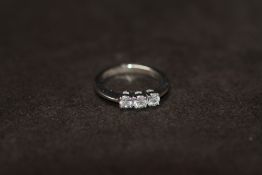 AN 18ct WHITE GOLD DIAMOND TRILOGY RING, RBC diamonds 0.50ct
