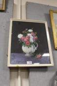 A FRAMED AND GLAZED STILL LIFE OIL PAINTING DEPICTING FLOWERS IN A JUG SIGNED ECCLESTONE LOWER LEFT