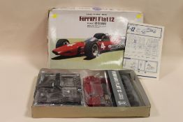 A VINTAGE BANDAI PLASTIC SCALE MODEL OF A FERRARI FLAT 12, CONTENTS NOT CHECKED