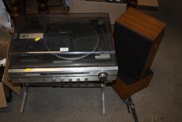 A SANYO G-1002 STEREO MUSIC CENTER ON STAND WITH SPEAKERS