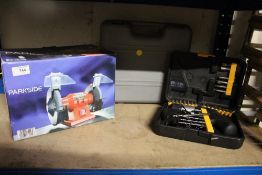A PARKSIDE BENCH GRINDER,PLUS TWO CASED DRILLS