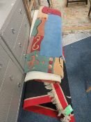 A LARGE CHINESE WOOLLEN RED AND BLACK RUG ?? x ?? cm TOGETHER WITH TWO OTHER RUGS (3)