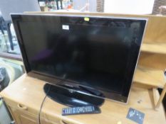 A SAMSUNG FLATSCREEN TV - REMOTE - HOUSE CLEARANCE