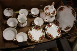A ROYAL ALBERT OLD COUNTRY ROSES CHINA SIX PERSON TEA SET Condition Report:The teapot has a chip