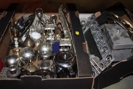 TWO TRAYS OF METALWARE TO INCLUDE CANDLESTICKS