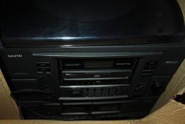 A SANYO STEREO AND SPEAKERS