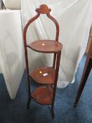 AN EDWARDIAN MAHOGANY INLAID THREE TIER DUMB WAITER
