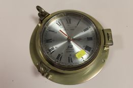 A PLASTIMO 'SHIP'S TIME' SHIP'S CLOCK