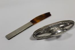 A VINTAGE HALLMARKED SILVER FOLDING COMB, TOGETHER WITH A FRENCH SILVER NAIL BUFFER