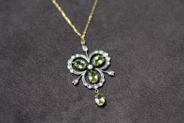 A NECKLACE SET WITH PERIDOTS, diamonds and seed pearl, boxed