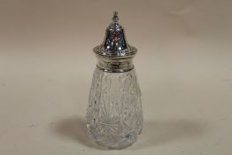 A HALLMARKED SILVER TOPPED CUT GLASS SUGAR CASTOR