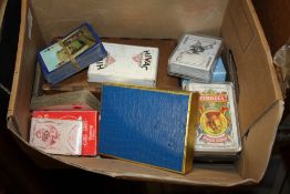 A QUANTITY OF VINTAGE PLAYING CARDS ETC..