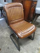 A MODERN BROWN LEATHER DINING CHAIR