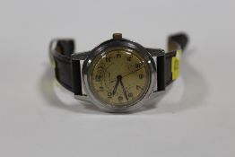 A VINTAGE GENTS P BUHRE WRISTWATCH ON LEATHER STRAP