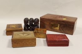 A COLLECTION OF TREEN LIDDED BOXES, CARVED WOODEN FIGURE ETC