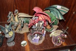 A COLLECTION OF RESIN DRAGON FIGURES (6)