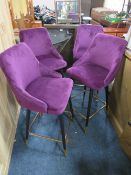 A SET OF FOUR MODERN PURPLE UPHOLSTERED BAR STOOLS