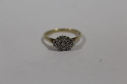 A 9 CARAT GOLD CLUSTER RING SIZE - Q APPROX WEIGHT - 2.3G