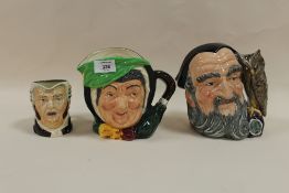 TWO LARGE ROYAL DOULTON CHARACTER JUGS COMPRISING MERLIN D6529 AND SAIRY GAMP D5451, TOGETHER WITH A
