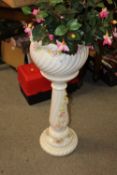A FLORAL JARDINIERE ON STAND