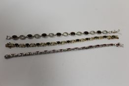 TWO STERLING SILVER GEM SET BRACELETS TOGETHER WITH A SILVER GILT EXAMPLE APPROX WEIGHT 36.7G