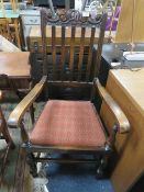 A 1920s / 30s OAK ARMCHAIR