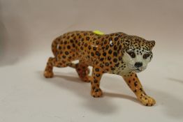 A BESWICK GLOSS FINISH FIGURE OF A LEOPARD