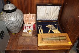 TWO SMALL CUTLERY BOXES AND CONTENTS TOGETHER WITH THREE TREEN LIDDED BOXES AND A SMALL BRASS