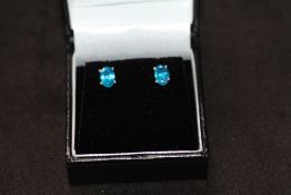 A PAIR OF NEON BLUE APATITE SILVER STUD, boxed