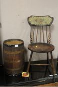 AN ANTIQUE STICK BACK CHAIR TOGETHER WITH AN OAK BANDED BARREL SHAPED STICK STAND (2)