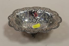 A HALLMARKED SILVER EMBOSSED BOWL RAISED ON PAW FEET APPROX WEIGHT - 140G