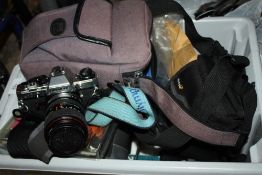 A BOX OF VINTAGE CAMERAS, LENSES ETC.