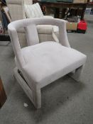 A MODERN GREY SUEDE OPEN ARMCHAIR