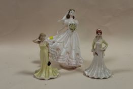 A COALPORT THE ROMANTIC BRIDE FIGURE, TOGETHER WITH TWO SMALLER COALPORT HEART TO HEART FIGURES (3)