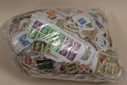 A BAG OF LOOSE STAMPS