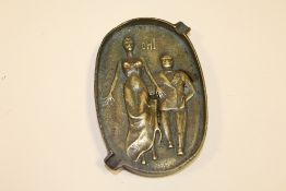 AN ART DECO RISQUE NOVELTY BRASS ASH TRAY