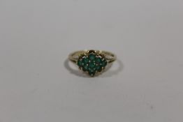 A 9K GOLD DRESS RING SET WITH GREEN STONES SIZE - Q APPROX WEIGHT - 2.3G