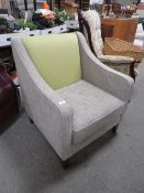A MODERN RETRO STYLE ARMCHAIR