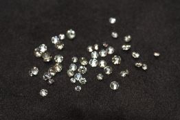 A PARCEL OF 4.93ct MIXED, LOOSE, RBC AND ROUND-CUT DIAMONDS