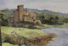 A FRAMED AND GLAZED WATERCOLOUR DEPICTING DUNVEGAN CASTLE, ISLE OF SKYE WITH SHEEP GRAZING IN THE