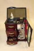 A JEWELLERY BOX AND CONTENTS