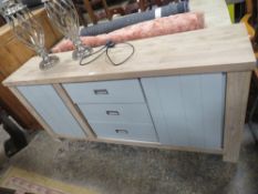 A LARGE MODERN SIDEBOARD WITH THREE CENTRAL DRAWERS AND SLIDING CUPBOARD DOORS, H 85 cm, W 180 cm, D