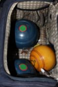 A BAG OF VINTAGE LAWN BOWLS