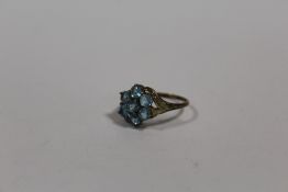 A 9 CARAT GOLD BLUE TOPAZ SET DRESS RING SIZE P APPROX WEIGHT - 2.5G